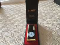 Isqueiro “SUNEX” a gás e com pedra.