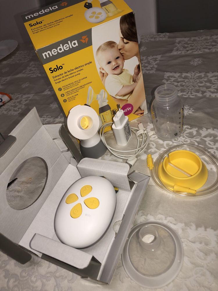 Máquina Medela Solo de tirar leite, PRACTICAMENTE NOVA