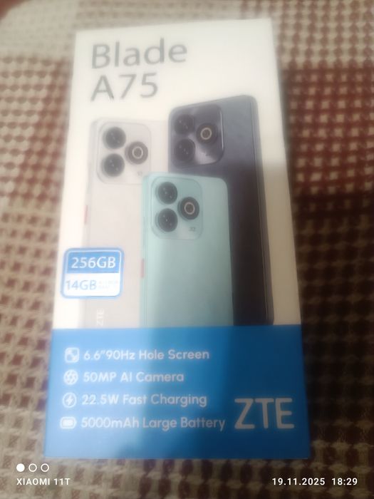Продам новый мобильный телефон zte A75 nubia v60 design