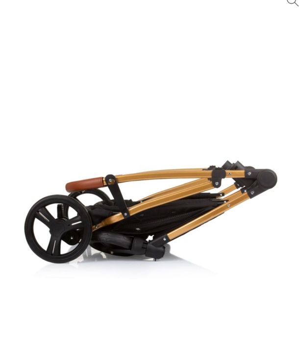 Carrinho de gemeos bebé chipolino preto com detalhes em dourado