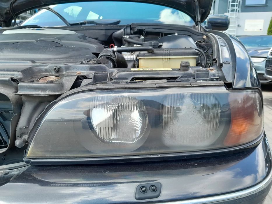 BMW E39 REFLEKTORY LAMPY PRZEDNIE KOMPLET XENON HELLA CZARNY ŚRODEK