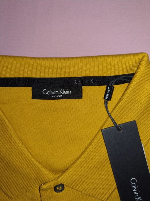 Wyprzedaż polo męskie Calvin Klein.