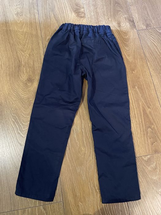 Bawełniane ekeganckie spodnie H&M 116
