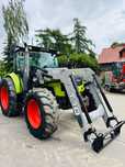 Claas Arion 410  Class Arion 410 z ładowaczem MX T10 na euroramce