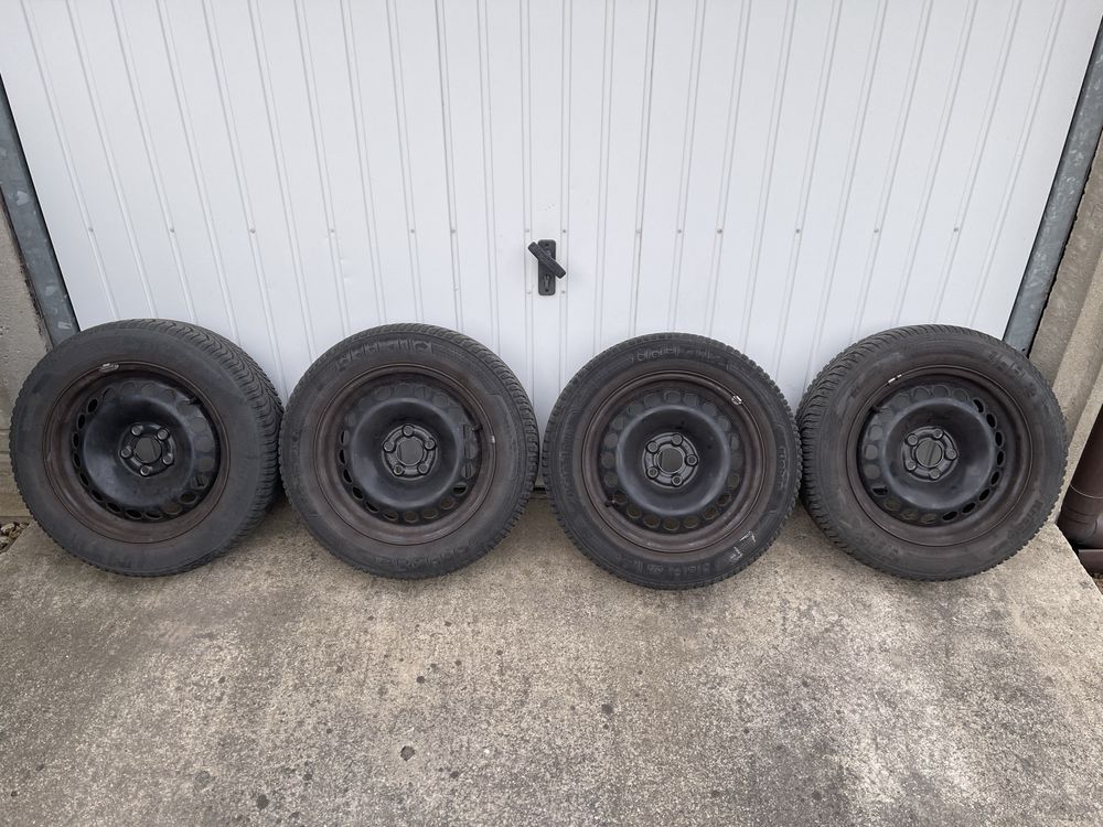 Felgi stalowe 5x100 z oponami zimowymi 185/60 R15  Audi Seat Skoda VW