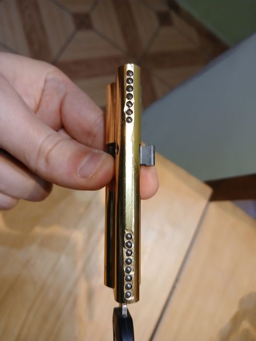 Wkładka do drzwi 35/60 mosiądz z jednym kluczykiem