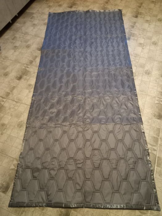 Термоизоляционная штора на двери.