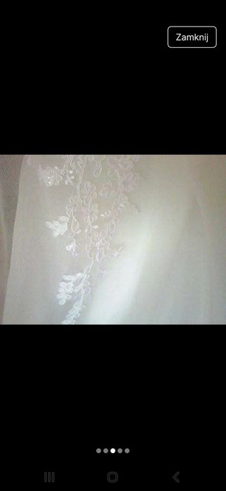 Suknia ślubna z kolekcji Elizabeth Passion, w kolorze ivory