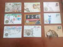 9 envelopes selados e com moedas novos e antigos