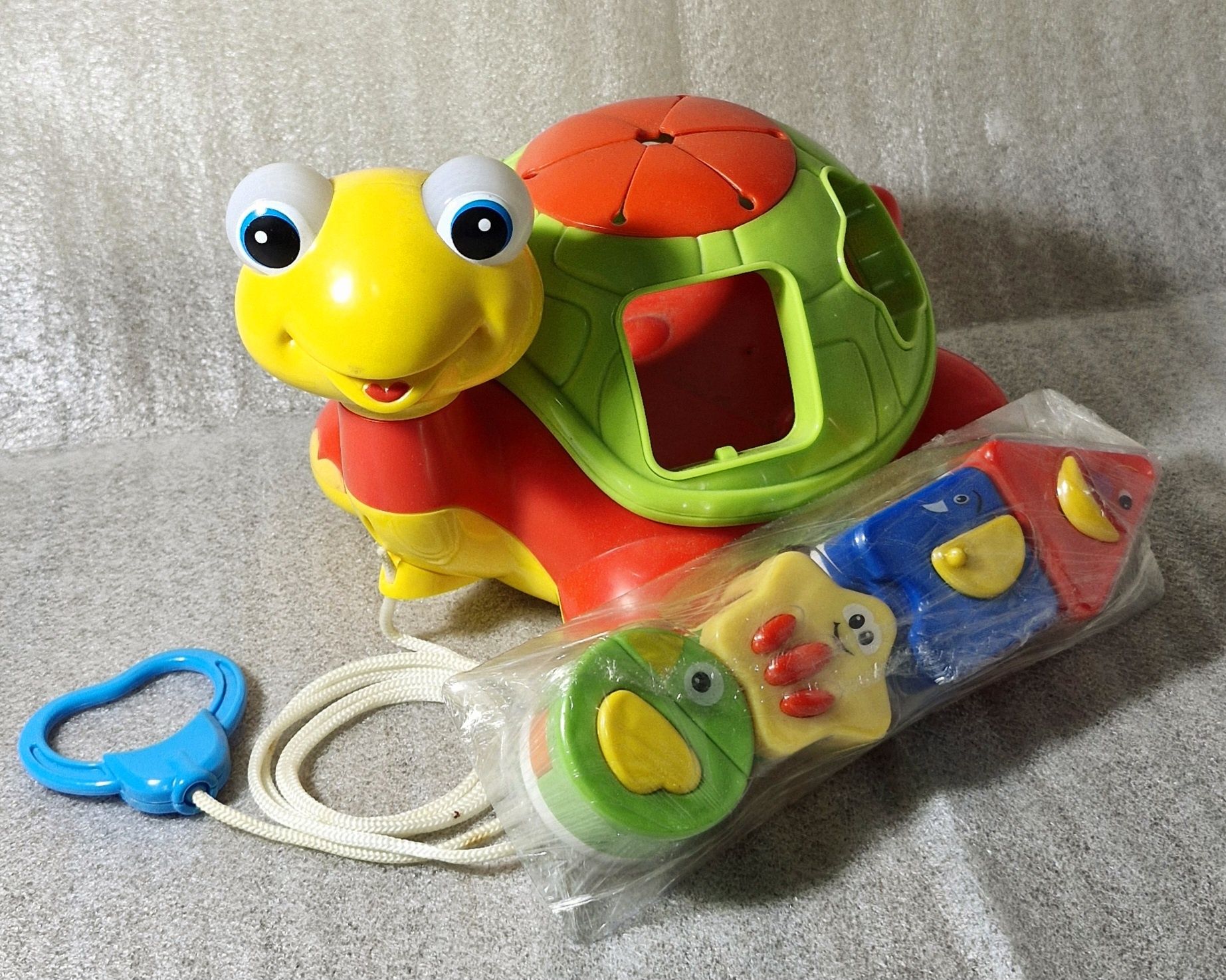 Развивающая игрушка каталка-сортер Черепаха-знайка