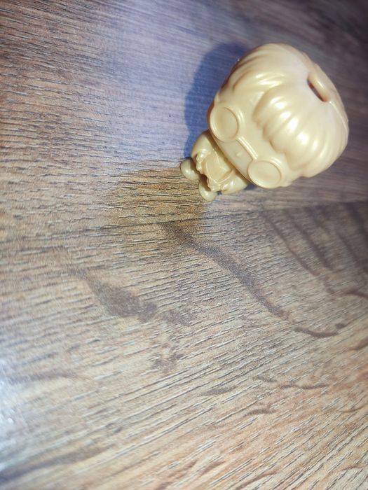 Золота колекційна фігурка Гаррі Поттера