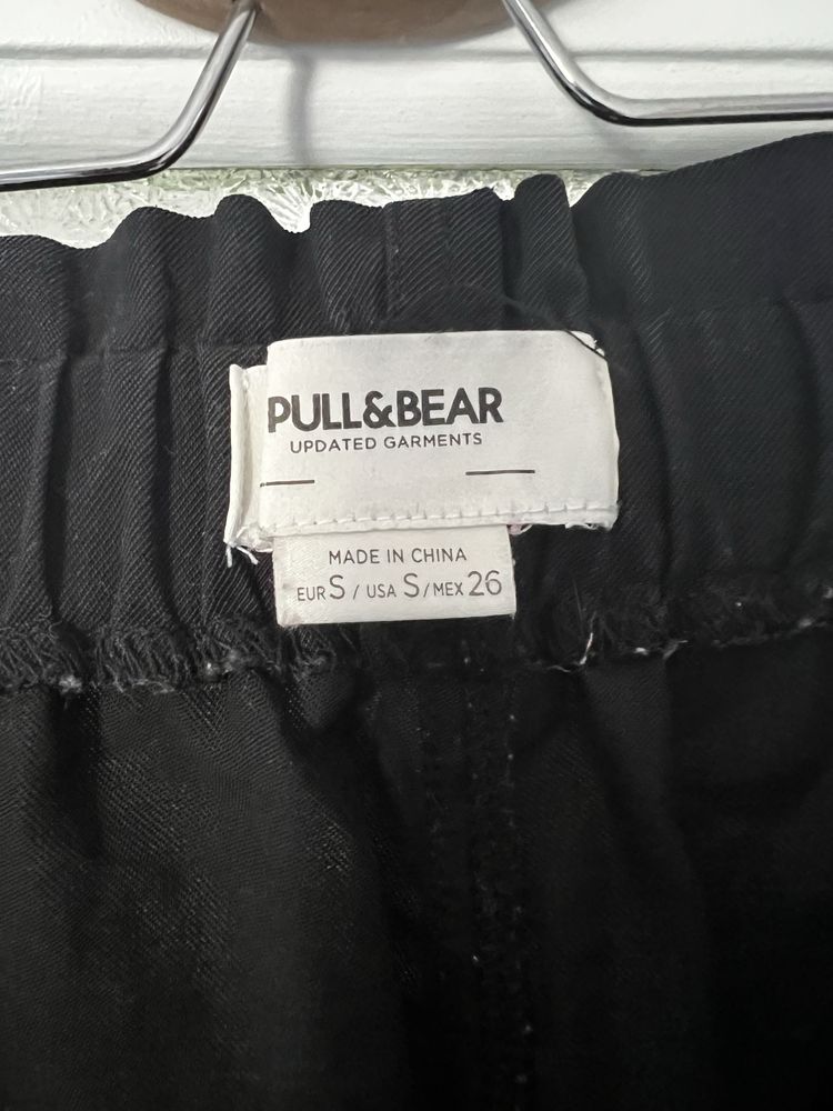 Calções pretos da Pull S