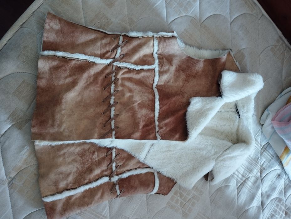Colete de pele com pêlo dentro