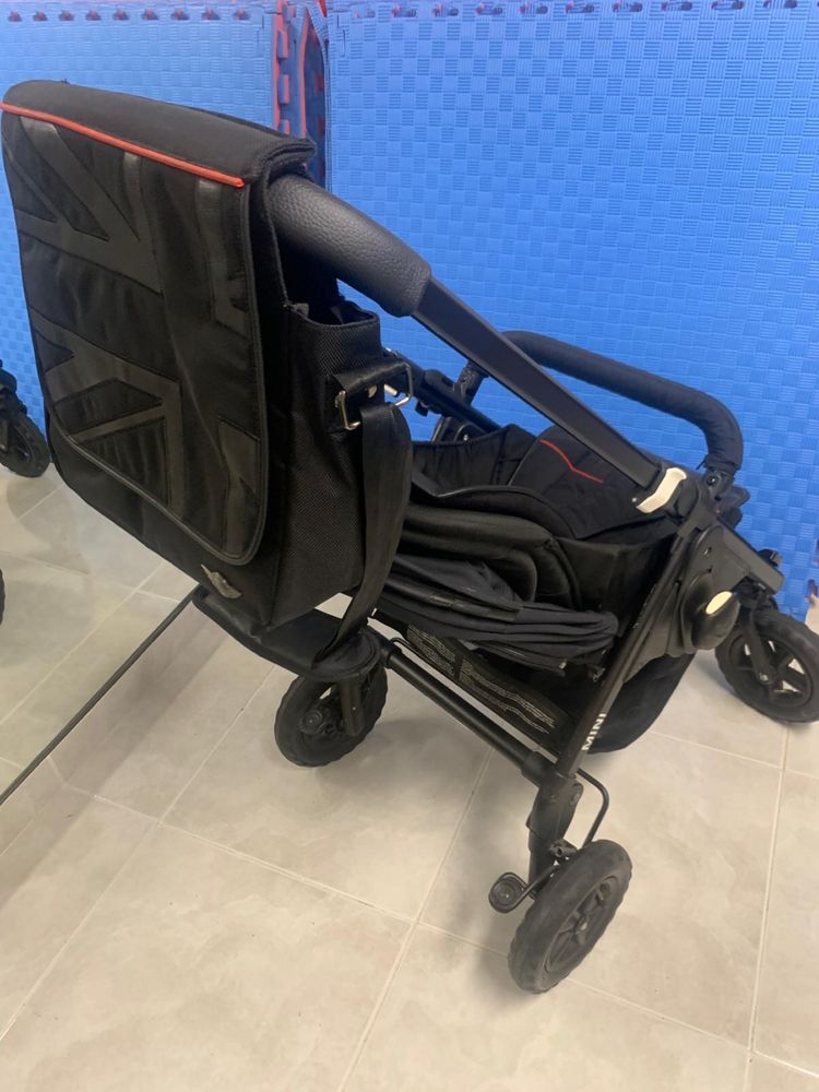 Carrinho bebé.