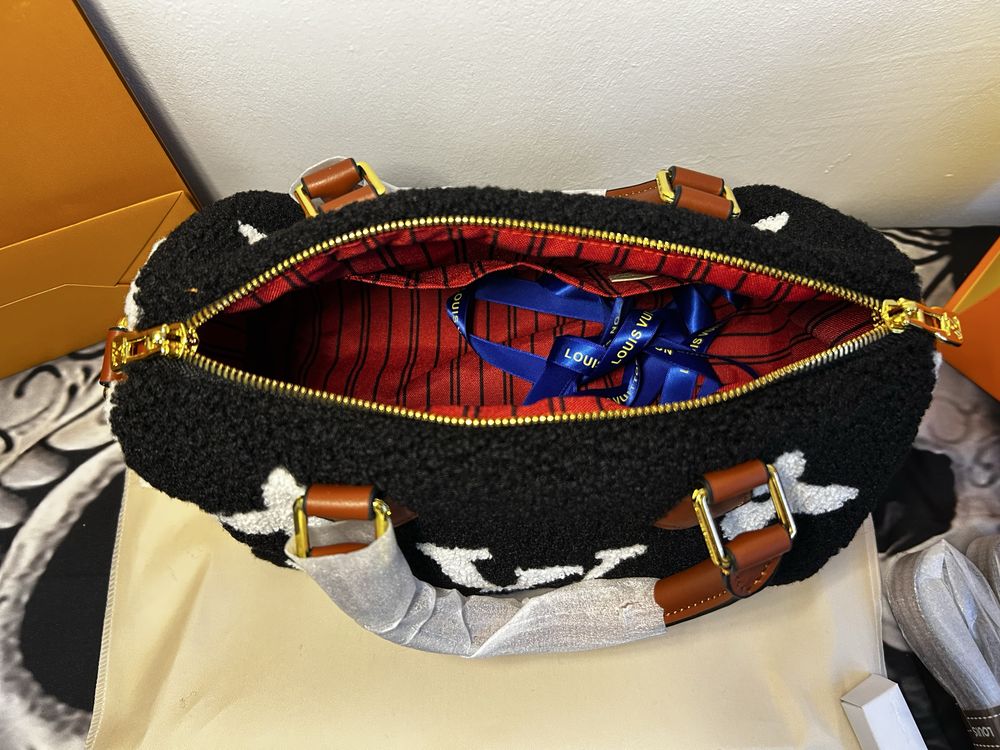 Louis Vuitton torebka.