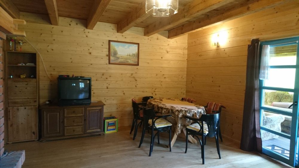 Drewniany domek na Mazurach, k. Rucianego-Nidy