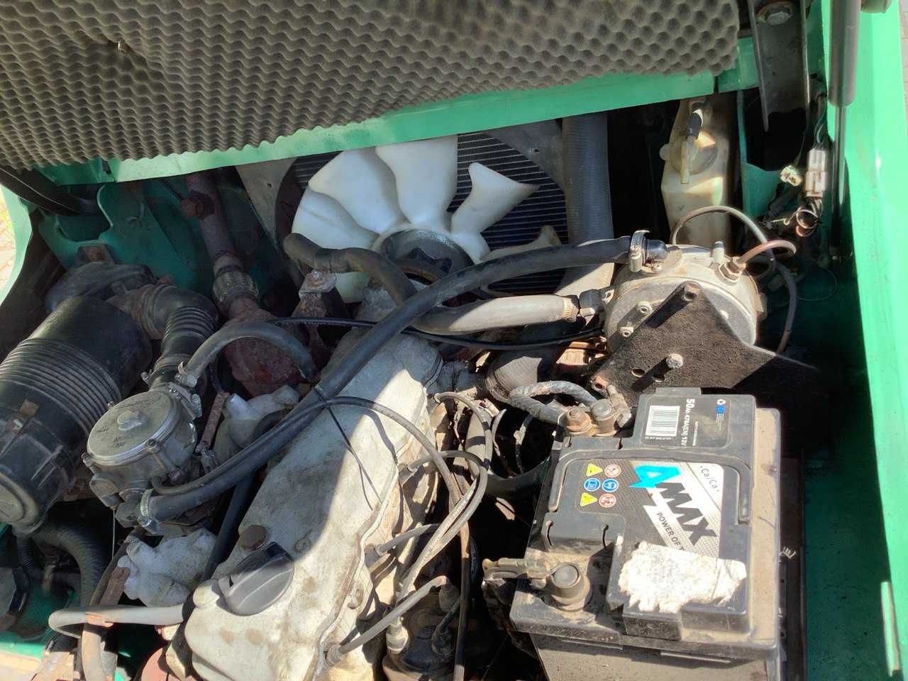 Gazowy wózek widłowy Mitsubishi FG25, triplex, po serwisie.
