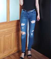 Jeansy Guess niebieskie z dziurami rock S 36 rurki skinny