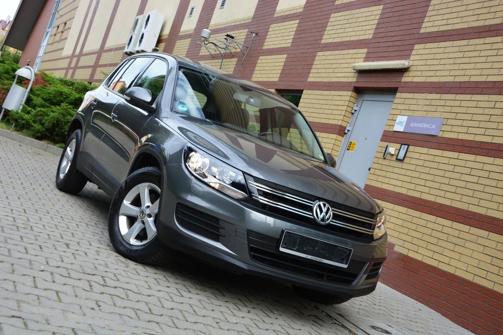 Volkswagen Tiguan 14r. 1,4i* 1ręka* ASO VW* HAK* Nawigacja* Grz.Fotele* Tempomat*WZOROWY