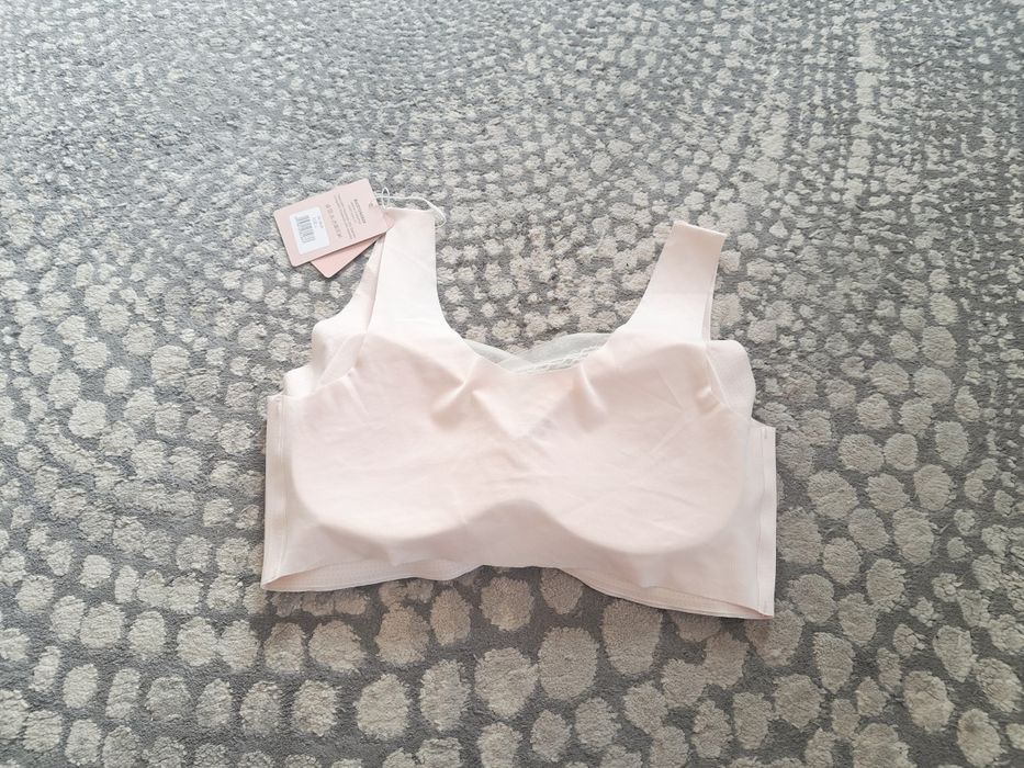 Nowy bezszwowy biustonosz beżowy Magnolia z ozdobną siateczką roz.L