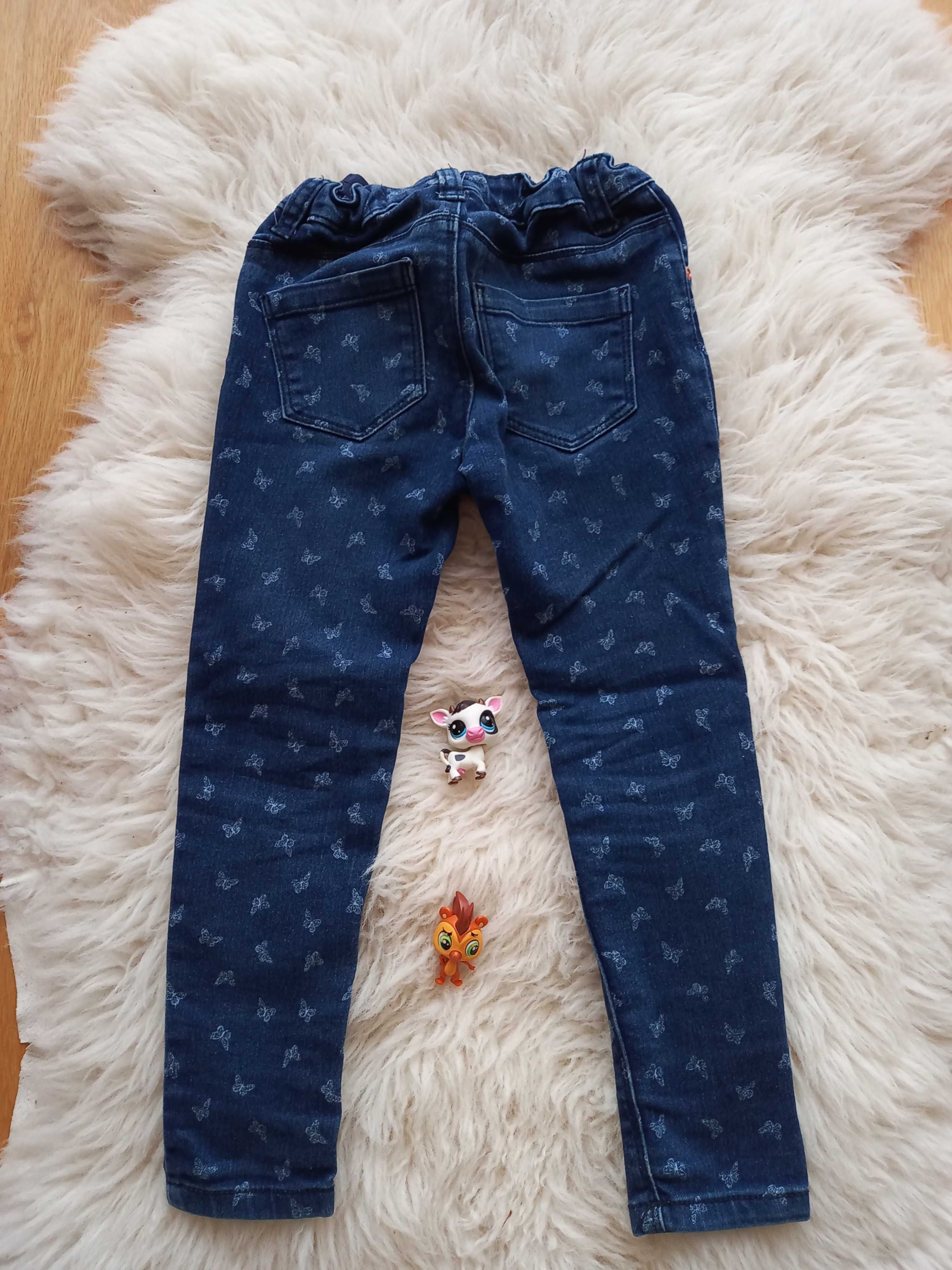 Długie spodnie jeansowe Primark w motylki w rozmiarze 116
