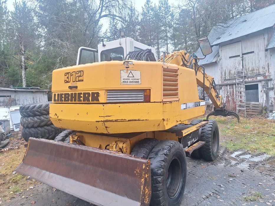 Koparka kołowa Liebherr 312 + rototil