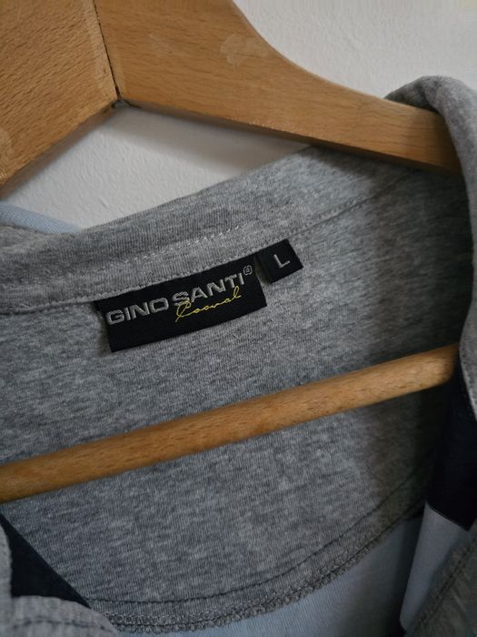 Męska koszulka polo w paski 
Bawełna
W błękitno-granatowe paski

Wymia