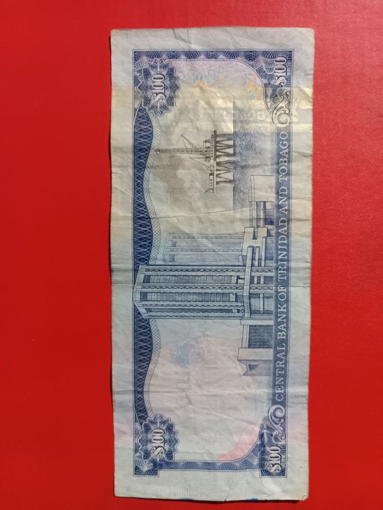 Сто  долларов Тринидад и Тобаго