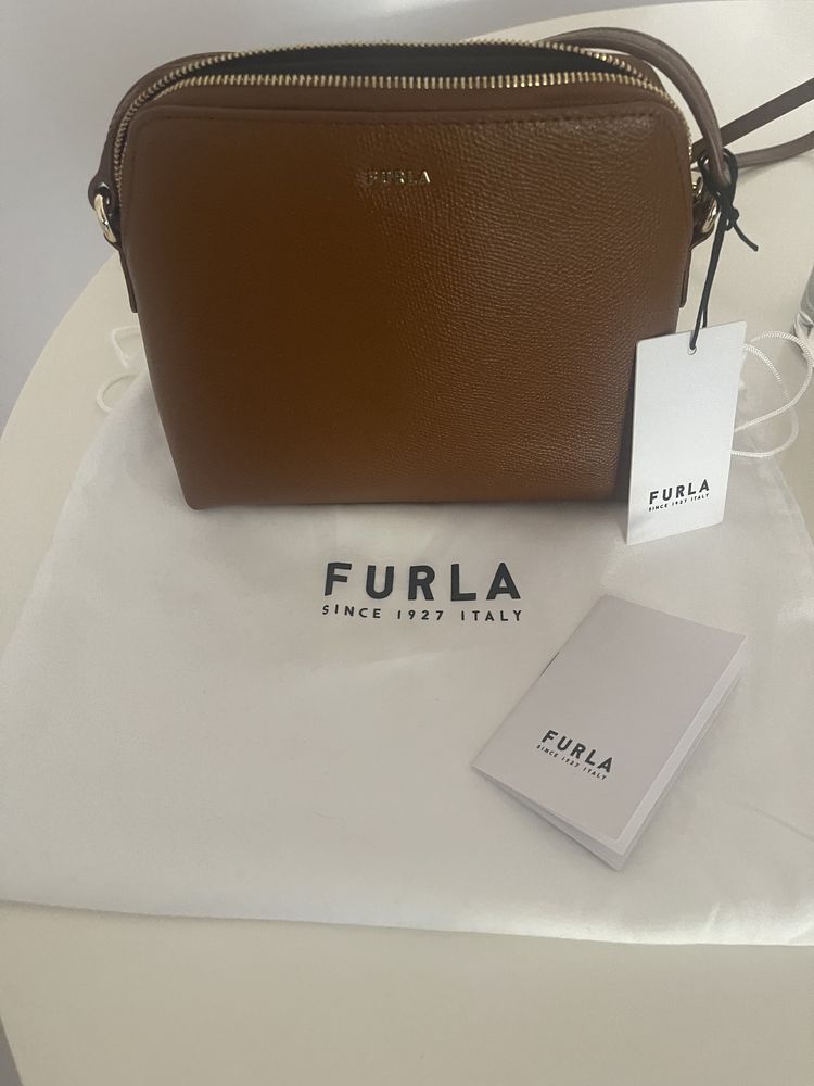 Mala Furla em pele