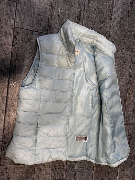 Пуховая желетка женская COLIN’S