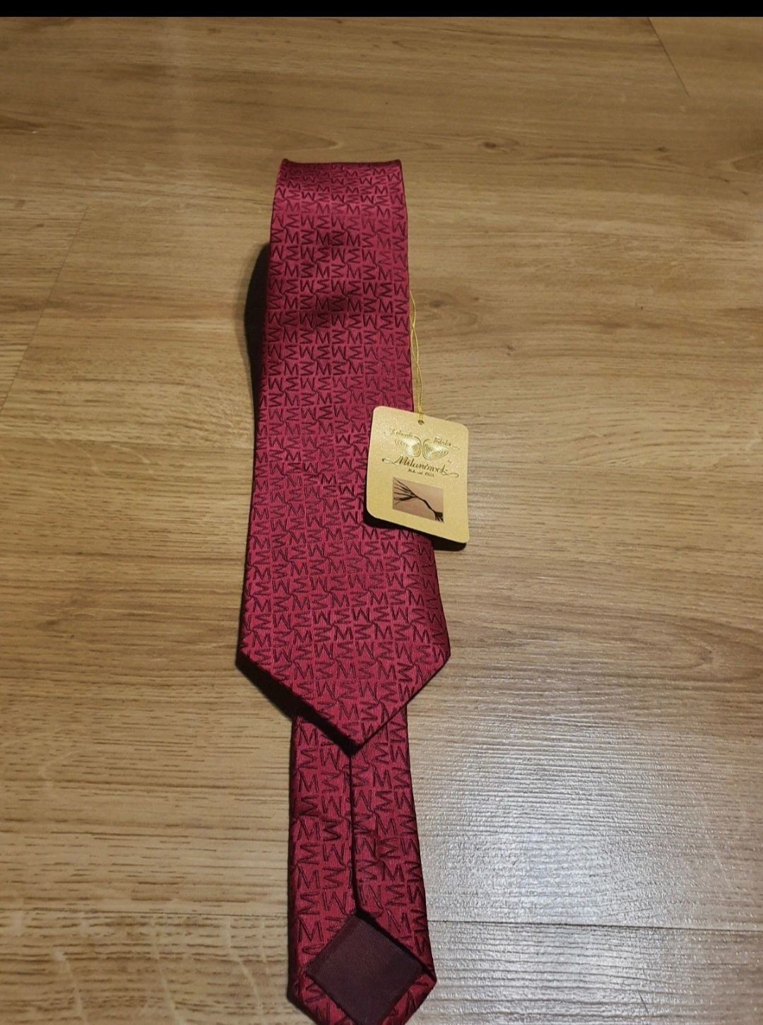 Bordowy krawat z jedwabiu, Gosia Baczyńska