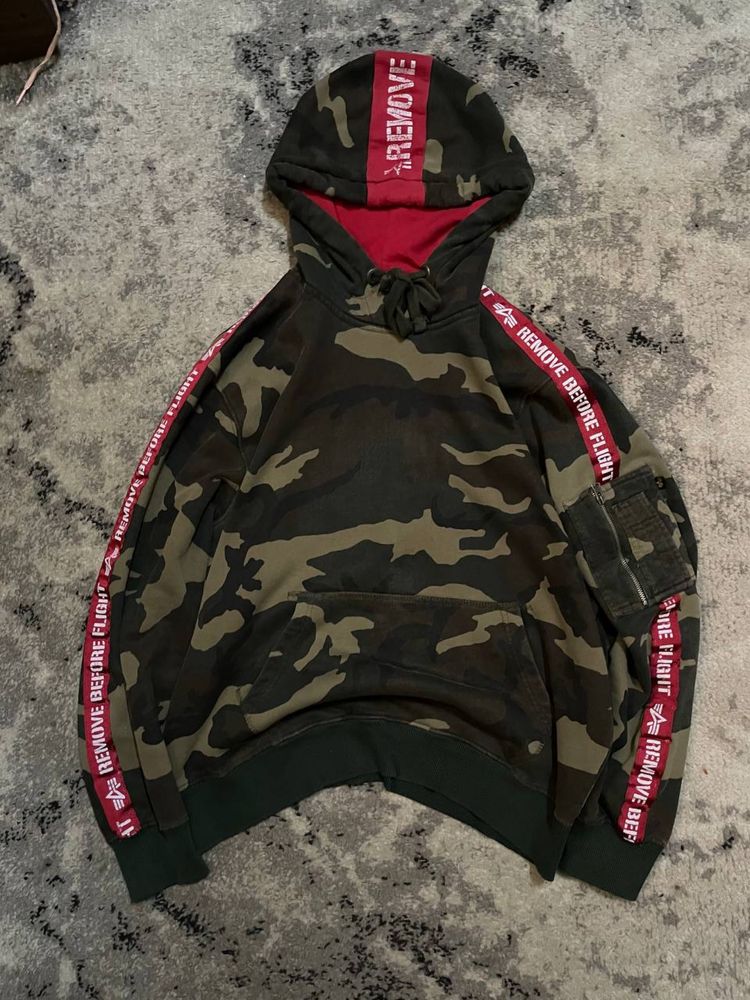 Вещь от бренда Alpha Industries