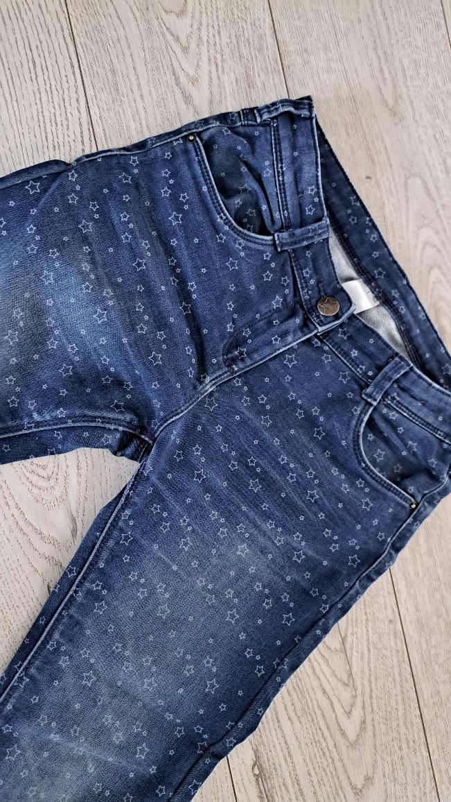 Spodnie dżinsy dla dziewczynki gwiazdki c&a 140 wycierane