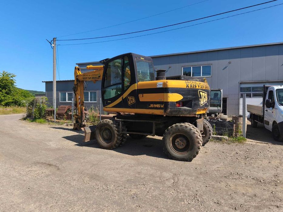 Колісний екскаватор повноповоротний екскаватор JCB JS145 2002року