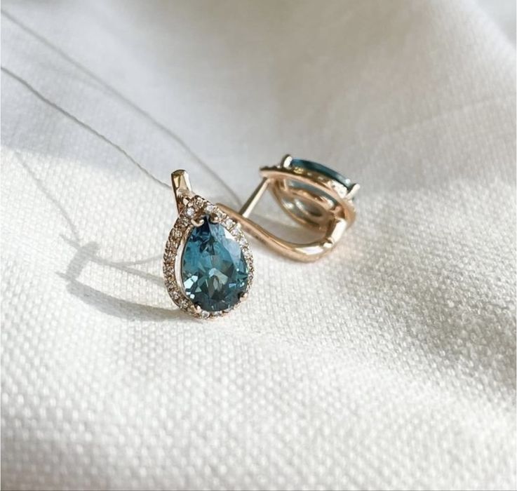 Золоті сережки з топазом б/у 585 проба