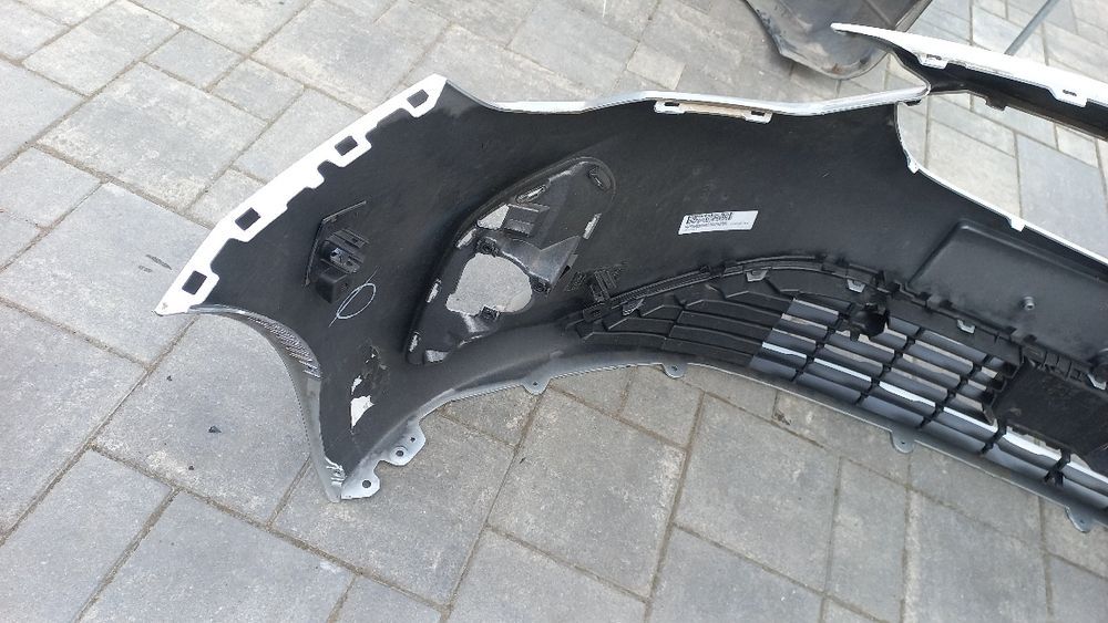 Opel Corsa f 19- zderzak przód przedni srebrny z176