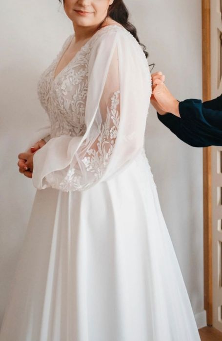 Suknia ślubna z długim rękawem