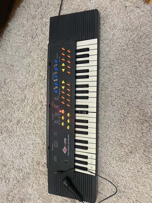 Дитяче піаніно,з мікрофоном