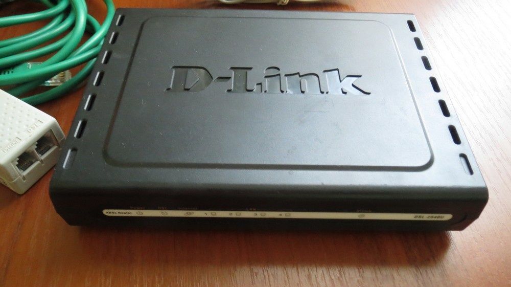 Модем D-Link DSL-2540U и Switch D-Link DES 1005A