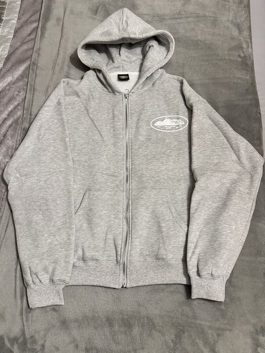 casaco cinza corteiz