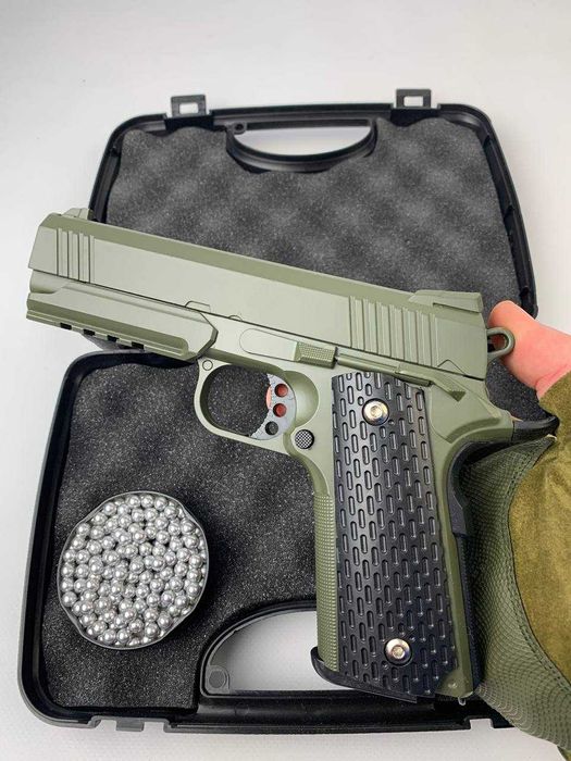 Металевий іграшковий пістолет Кольт Colt залізний дитячий на пулях