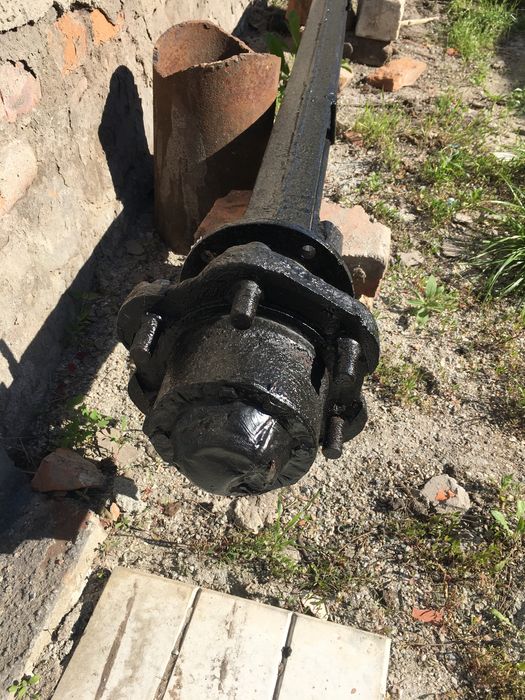 Балка з ступецями для прицепа