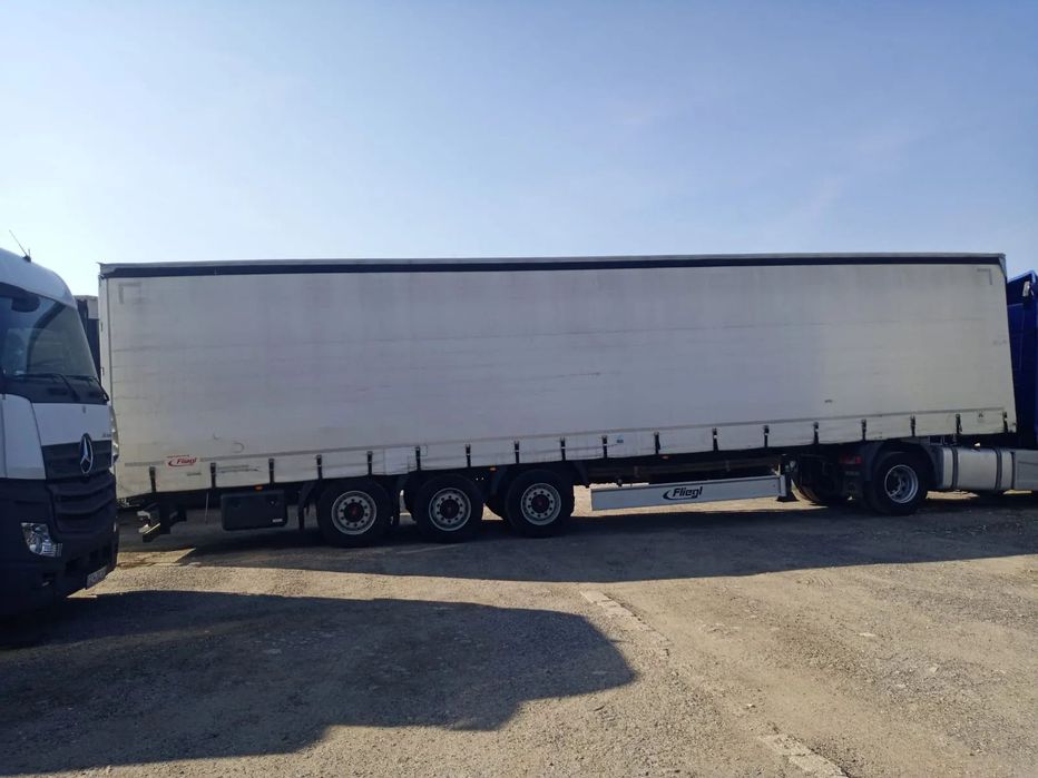 Fliegl SDS 01  NACZEPA FLIEGL 2 osie podnoszone, wzmacniana plandeka