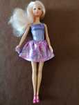 Lalka Barbie piosenkarka plus zestaw:gitara, mikrofon, radio.