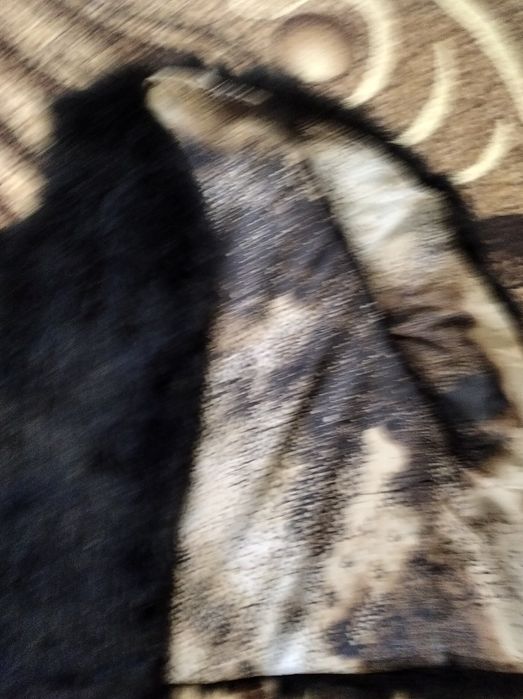 Меховая жилетка женская