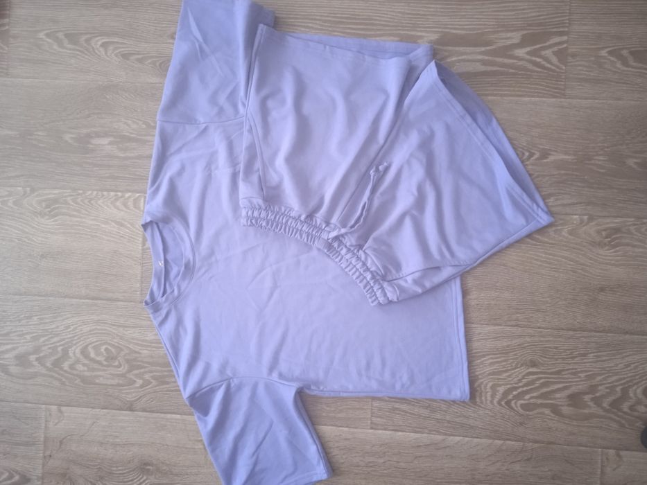 Костюм бузкового кольору