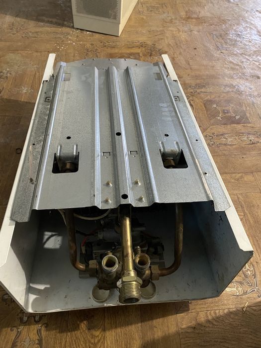 Конвектор (новий) 8 тис. та газова колонка Junkers,б.у. 2 тис.