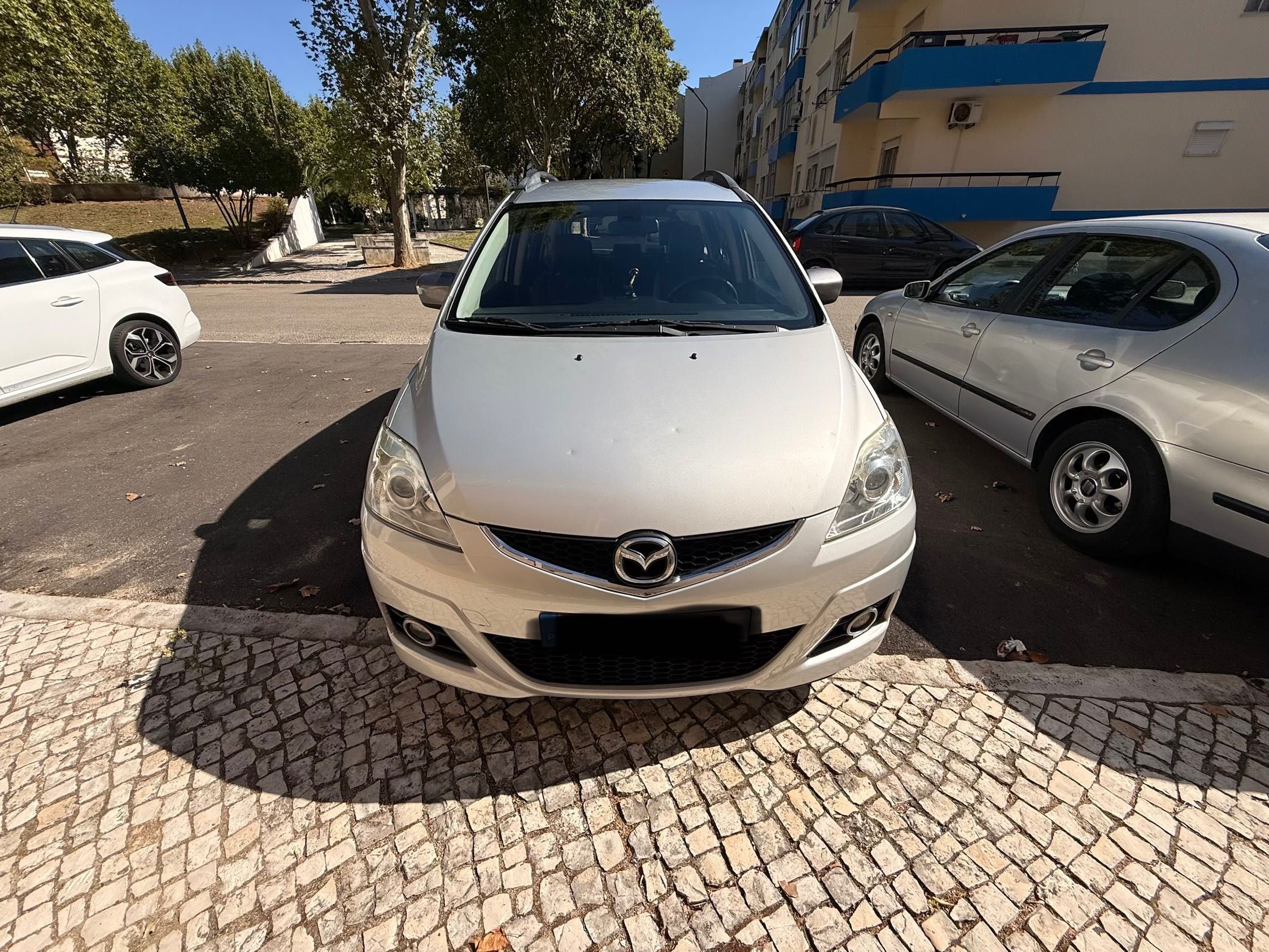 Mazda 5 - 2010 - 7 lugares