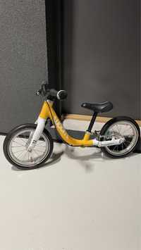 Woom 1 - rowerek biegowy żółty