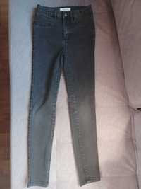 Spodnie dżinsowe dla dziewczynki Reserved 146